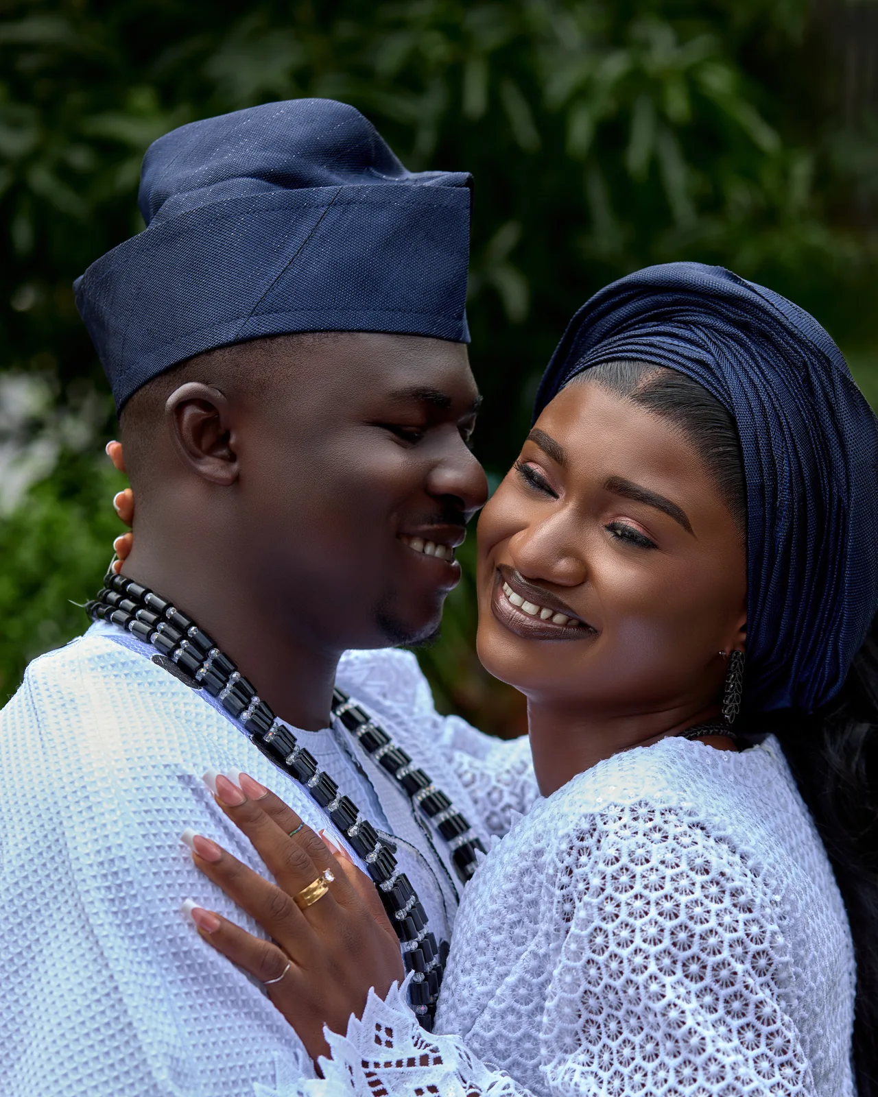 The couple sharing a happy moment in the garden
